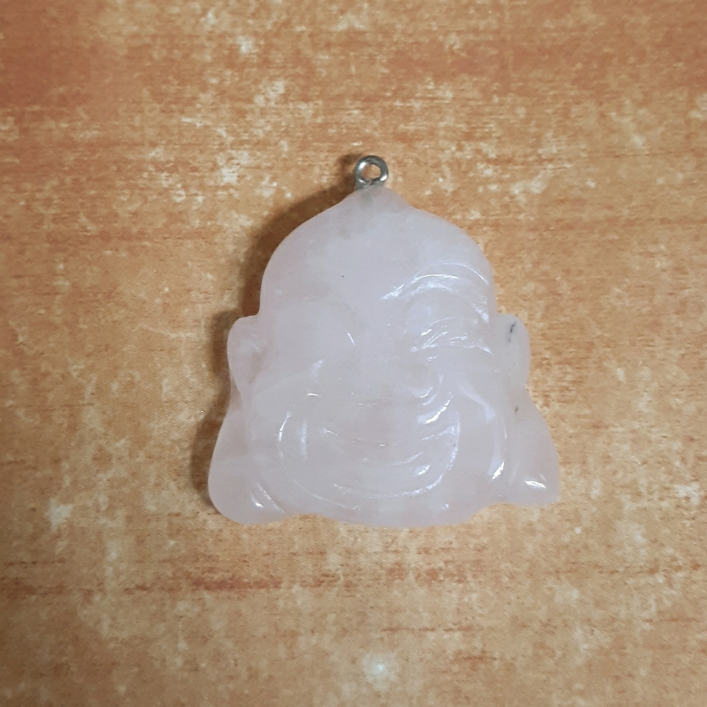 New Carved Rose Quartz Buddha Head Pendant.